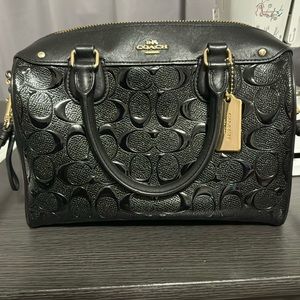 Black leather coach handbag